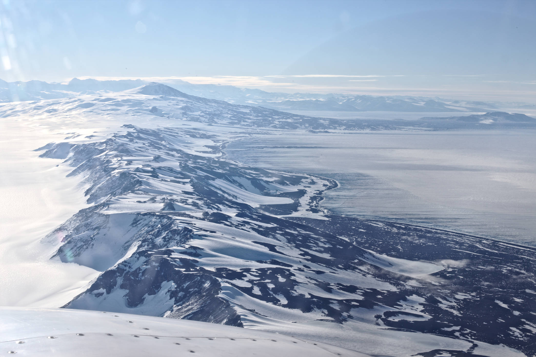 Almost there. One final stretch of mountains before crossing the glacier ice and sea ice that separates Ross Island from mainland Antarctica