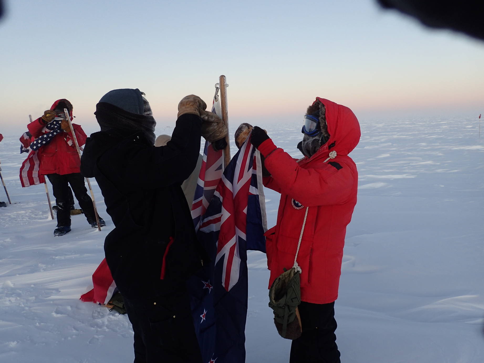 Exchange of the UK flag (Photo: John Dinovo)