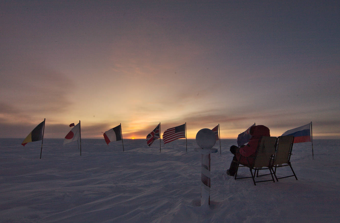 Sitting at the cermonial pole marker, watching the sunrise.